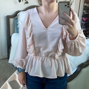 pale pink ruffle shirt